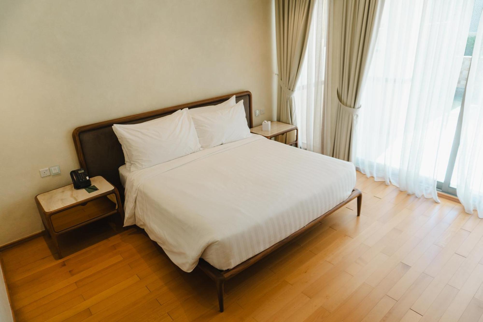 รีฟ รีสอร์ต Hotel มานามา ภายนอก รูปภาพ A bedroom in a hotel