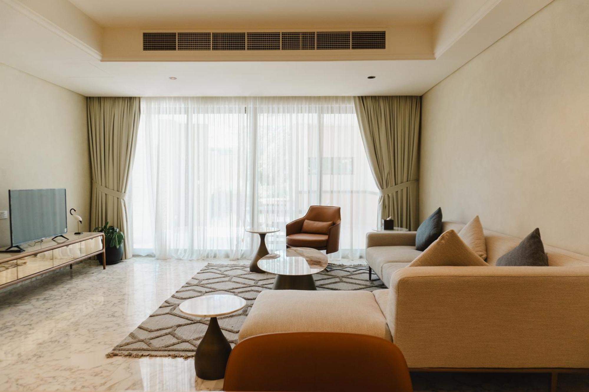 รีฟ รีสอร์ต Hotel มานามา ภายนอก รูปภาพ A living room in a condominium